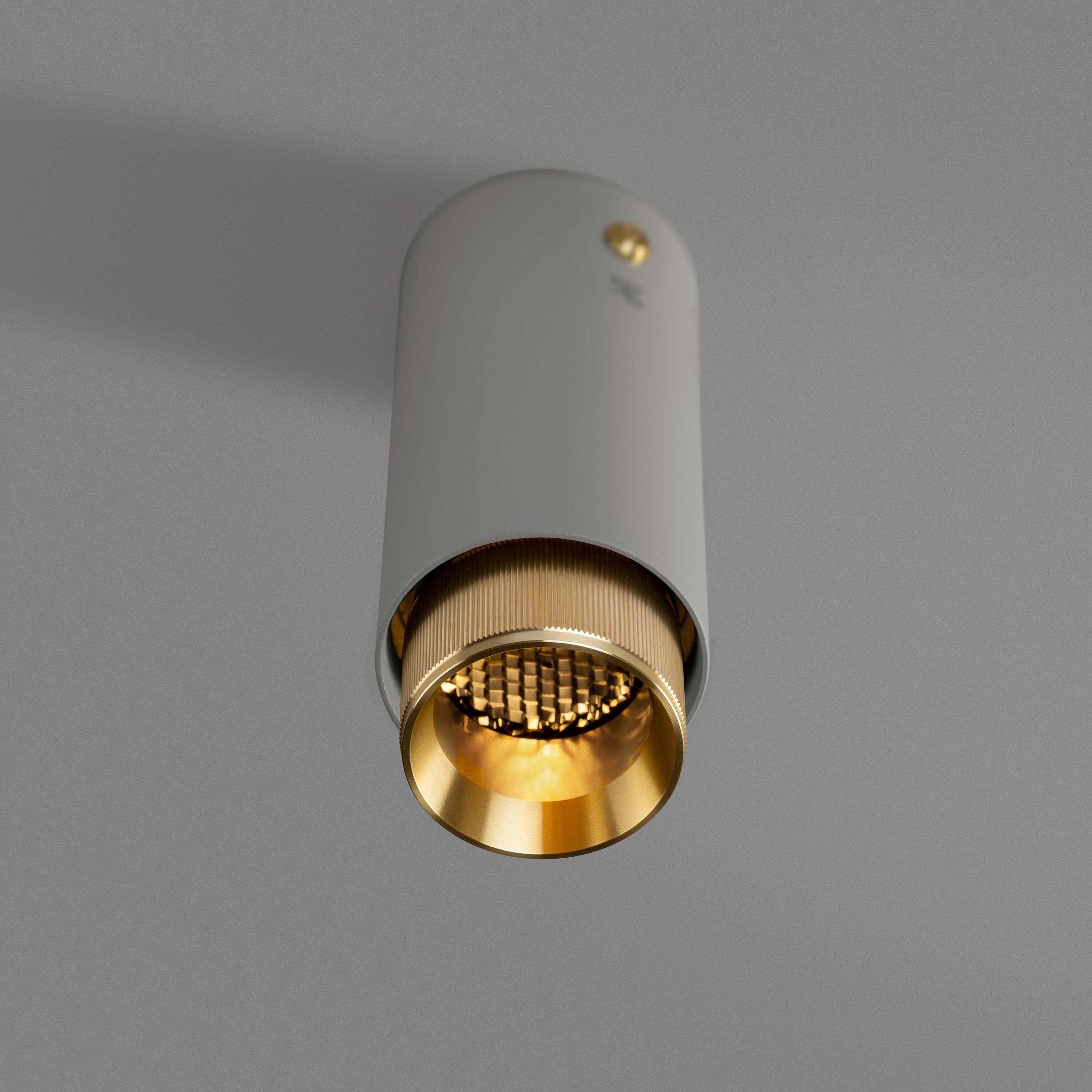 Exhaust Surface spot i sten med detaljer i massiv mässing • Buster + Punch