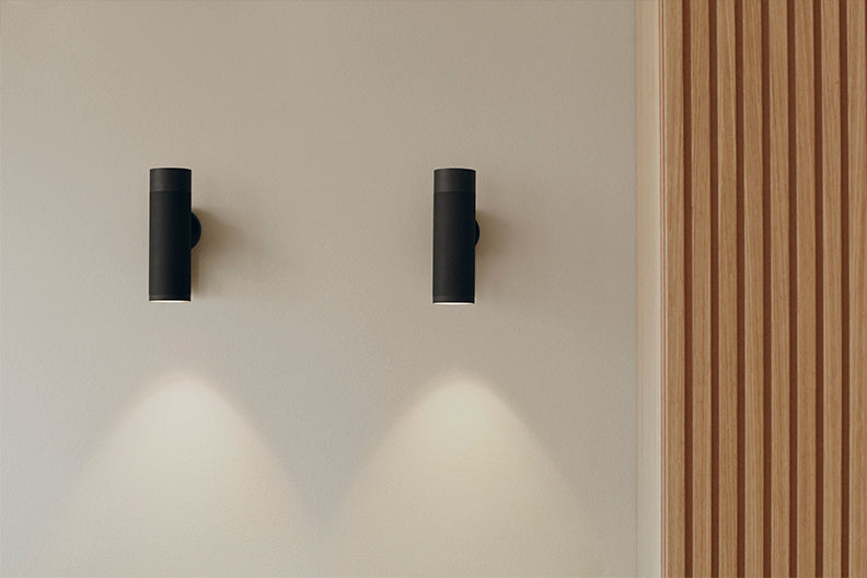 Patrone-vägglampa svart brunerad mässing • Thorup Copenhagen