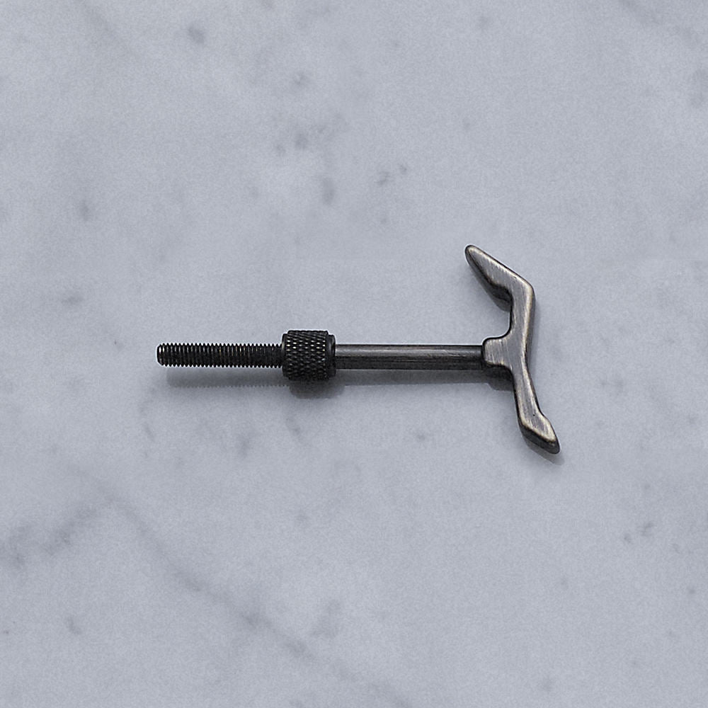 Krok i smoked bronze med rå design.
