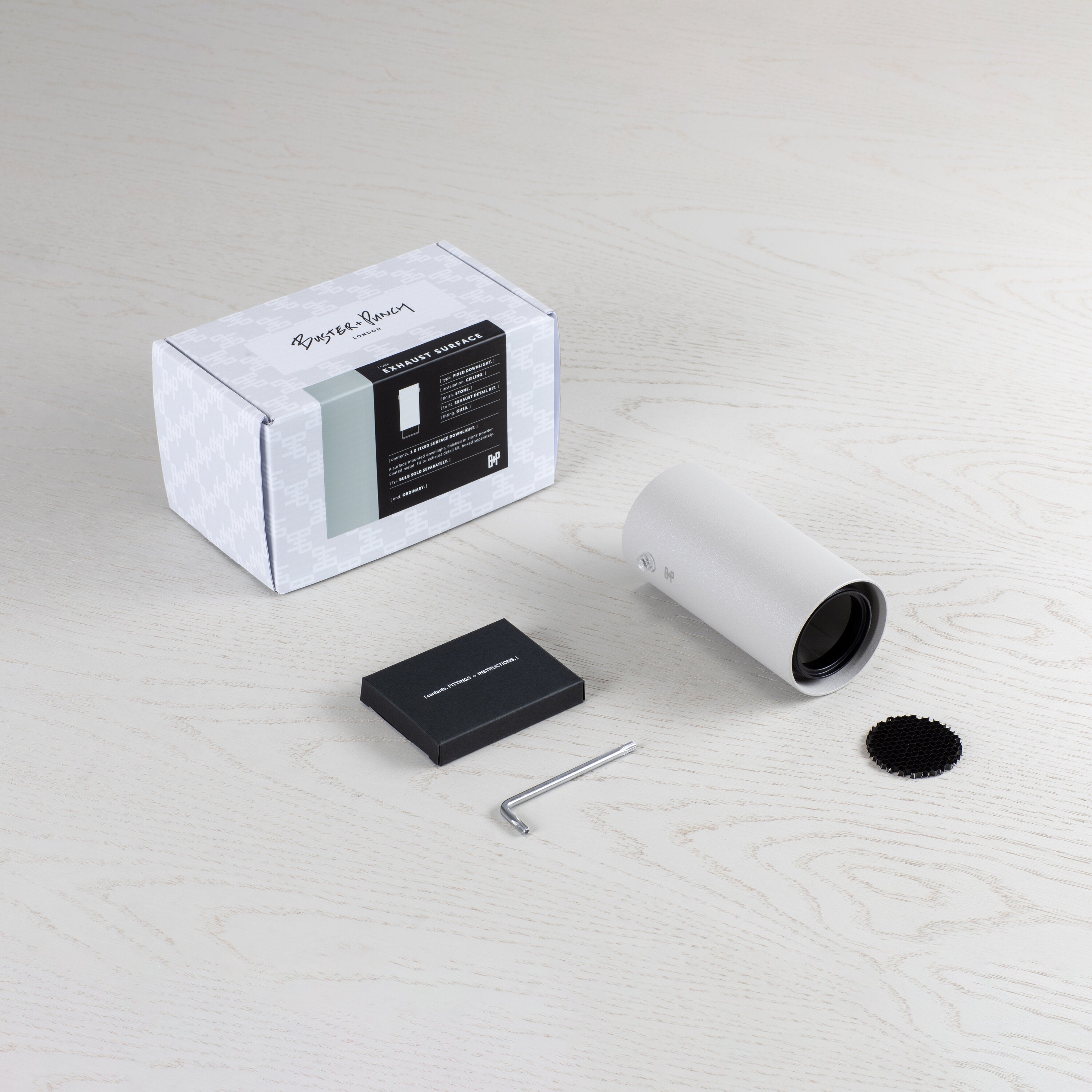 Exhaust Surface spot i sten med detaljer i gun metal  • Buster + Punch