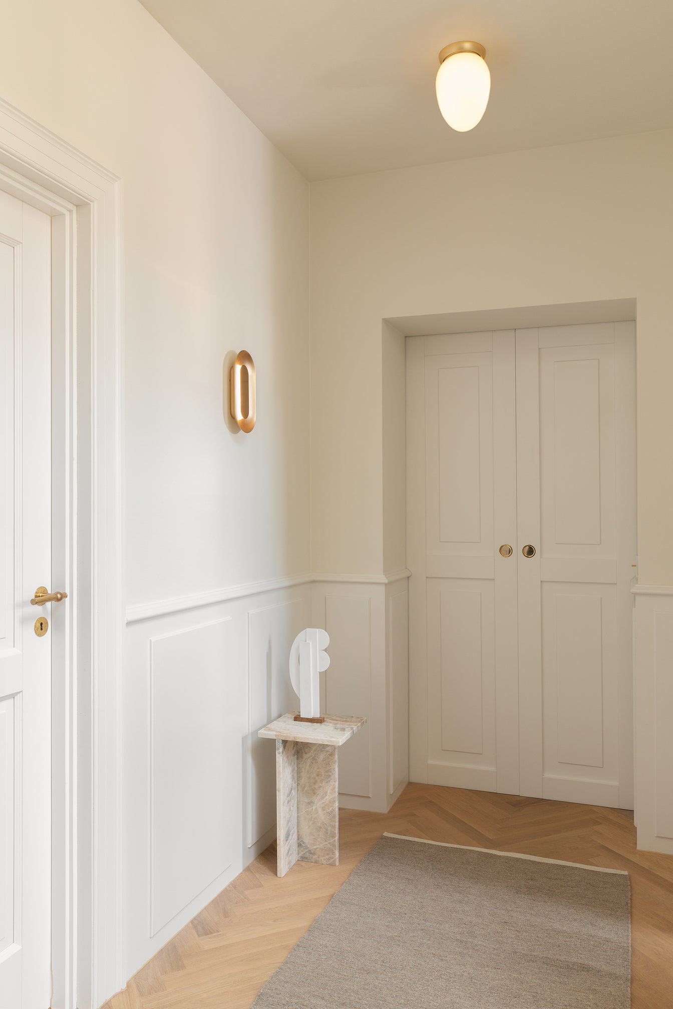 Sasi Small vägglampa, brass • NUURA